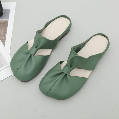 Women’s slip-on shoes with a bow and a soft sole